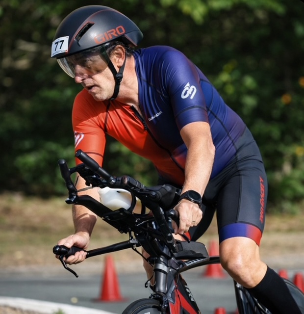 Coach Trindall on the bike leg of a triathlon race
